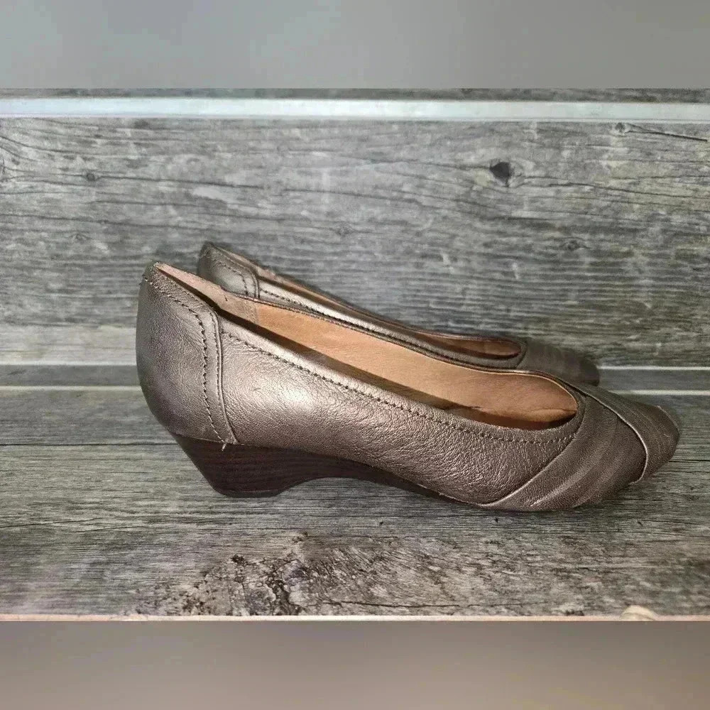 Clark’s gold wedge shoes